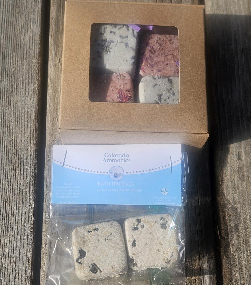 a box of 4 bath truffles and pack of 2 bath truffles